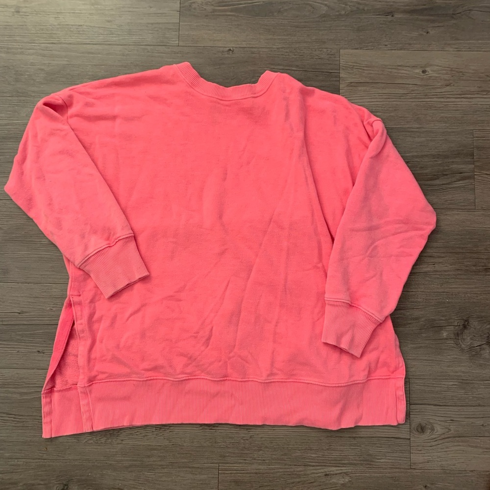 Pink aerie crew neck with slits at the bottom size L